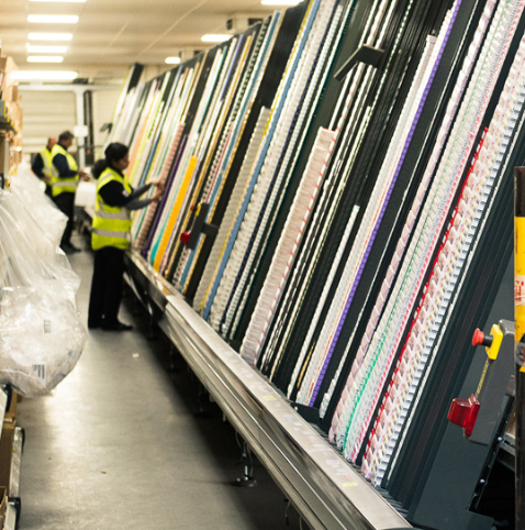 Leach & Burton operations staff fulfilling customer orders along the picking line